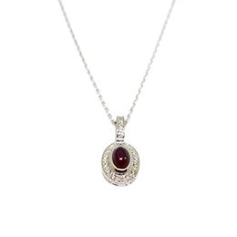 Gold Pendant: Cabochon Ruby and Diamonds